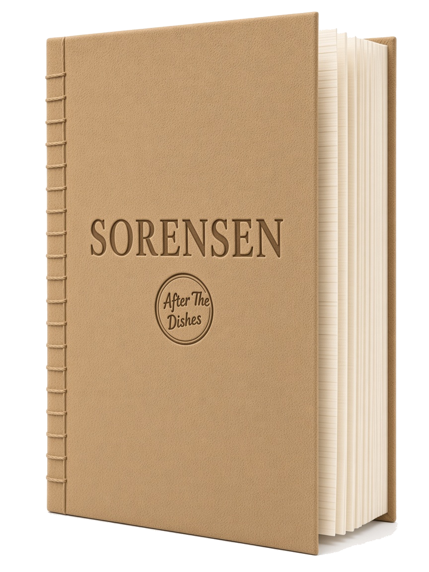 Sorensen family booklet: suede cover, the name branded in the center, After The Dishes stamped below, cream pages at the edge.